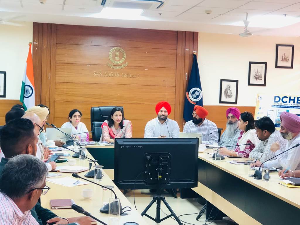 Deputy Commissioner Komal Mittal and District Traders Commission Chairman Ranjit Pal Singh review pending issues of traders